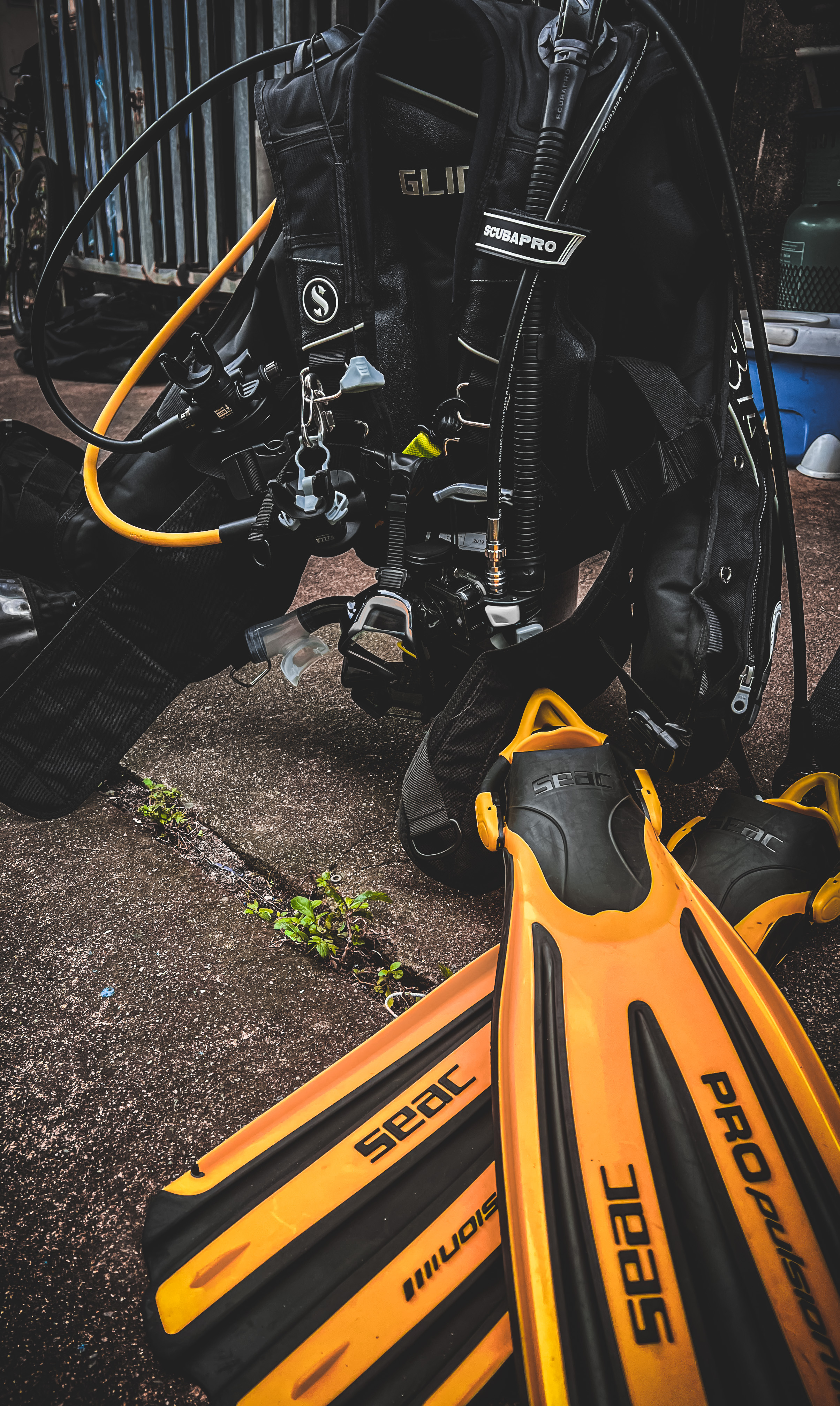 Scuba gear laid out on a bench, checked and re-checked before a dive.